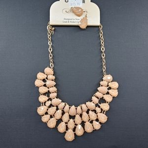 Bib necklace in tan and gold .Free 🎁w/purcha